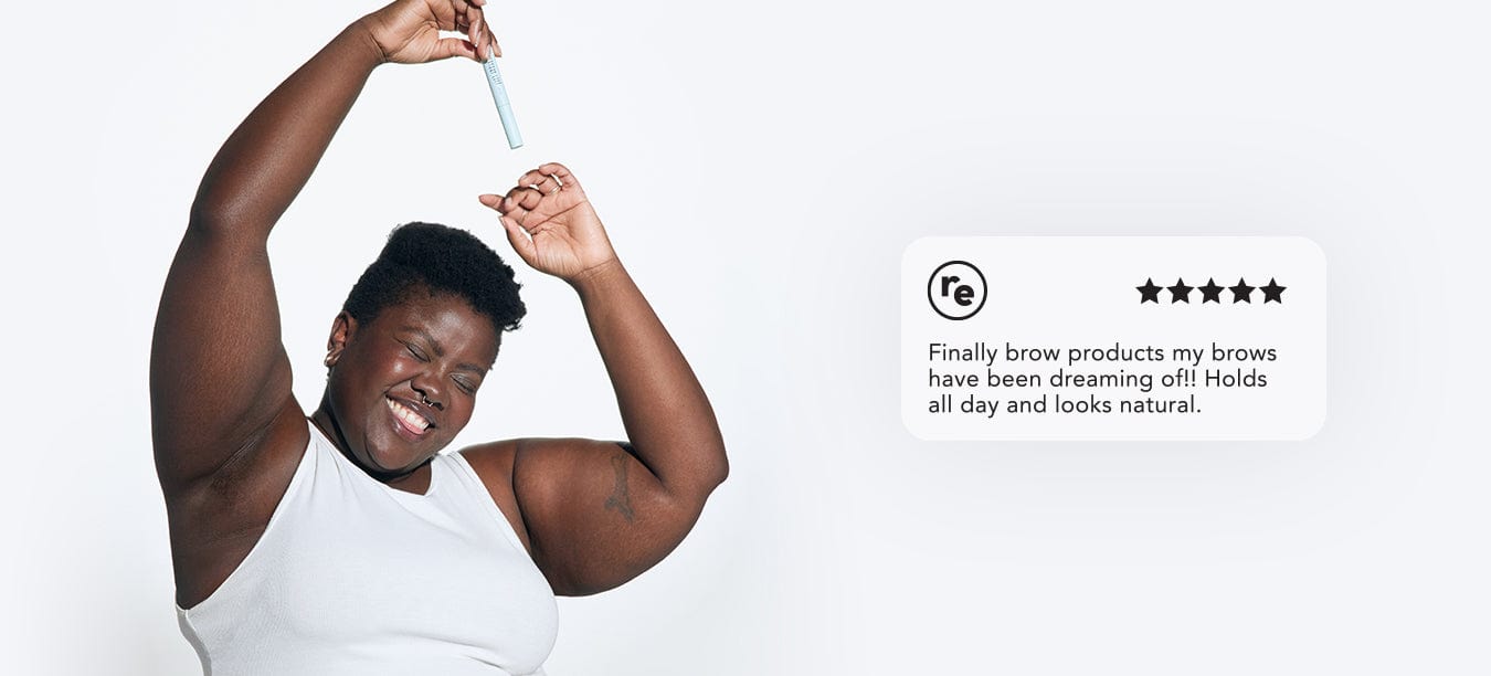 Model holding product over her head and smiling next to product review:"finally brow products my brows have been dreaming of! Holds all day and looks natural.